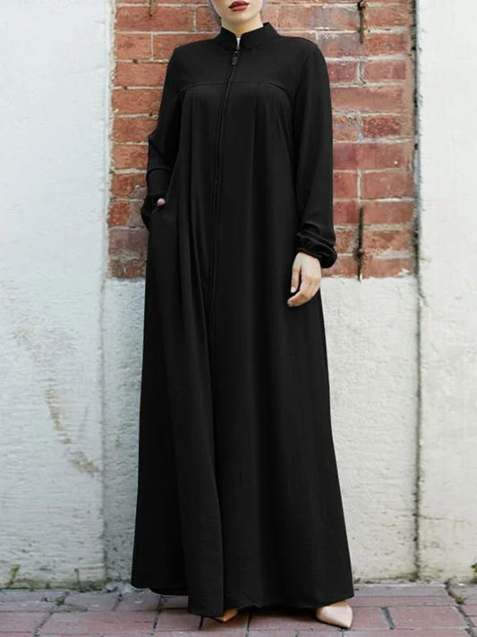 Muslimisches schwarzes Kleid mit kleinem Stehkragen und Reißverschlusstasche im eleganten, lockeren und lässigen Langarmrock
