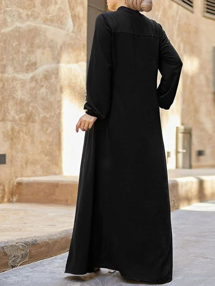 Muslimisches schwarzes Kleid mit kleinem Stehkragen und Reißverschlusstasche im eleganten, lockeren und lässigen Langarmrock